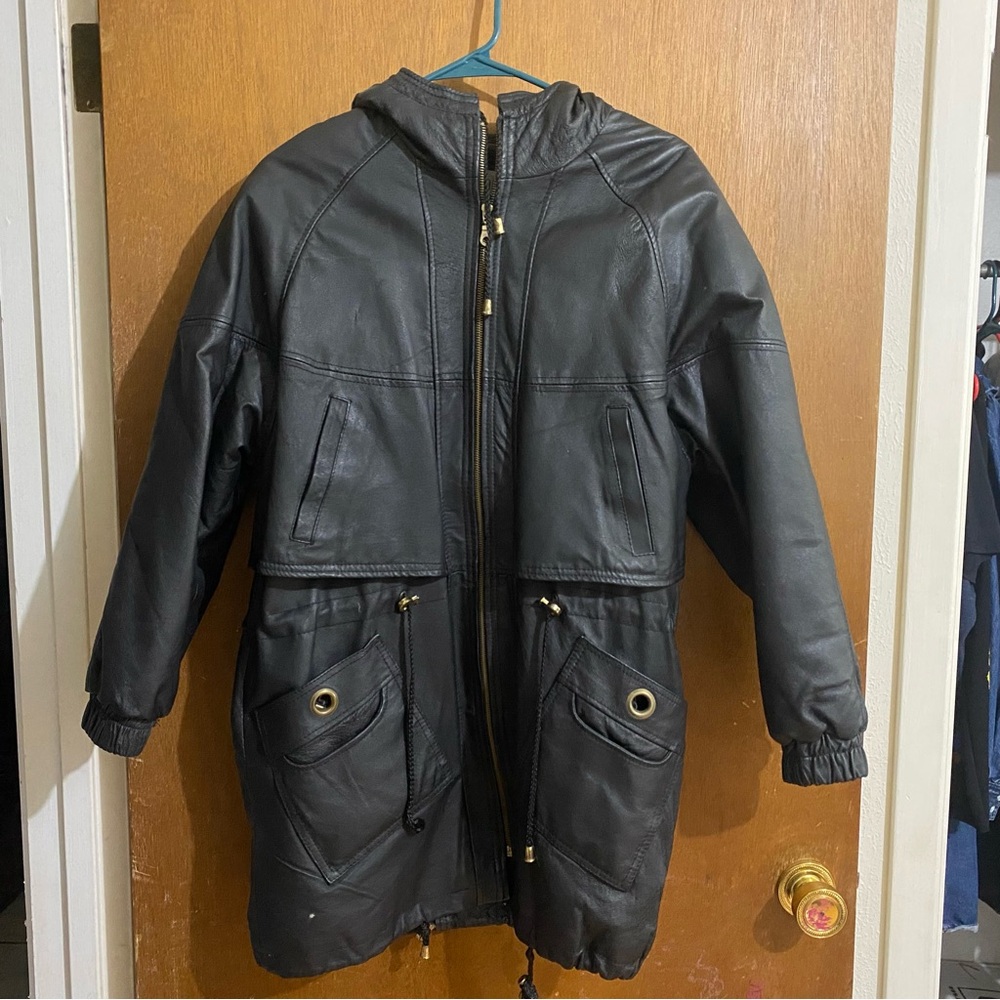 Size small black COMINT vintage leather jacket with hood.
